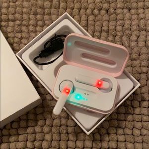 Pink wireless headphones by True Wireless
